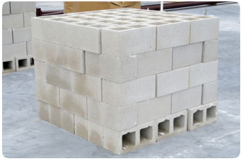 stacking concrete blocks